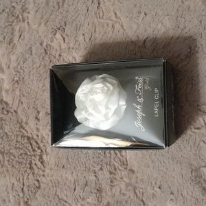 Joseph and Feiss lapel pin